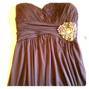 Navy strapless formal gown.